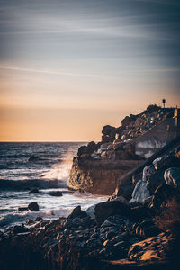 Scenic view of sea against sky during sunset
