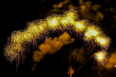 Close-up of firework display at night