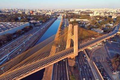 High angle view of bridge and buildings in city