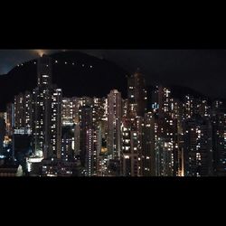 Illuminated cityscape at night