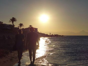 Scenic view of sea at sunset