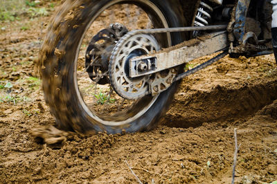 Close-up of dirt bike on field