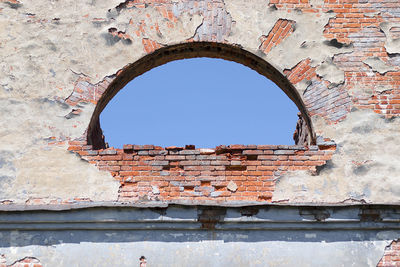 View of old wall through hole