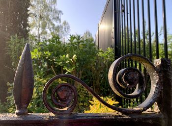 Close-up of rusty wheel in yard