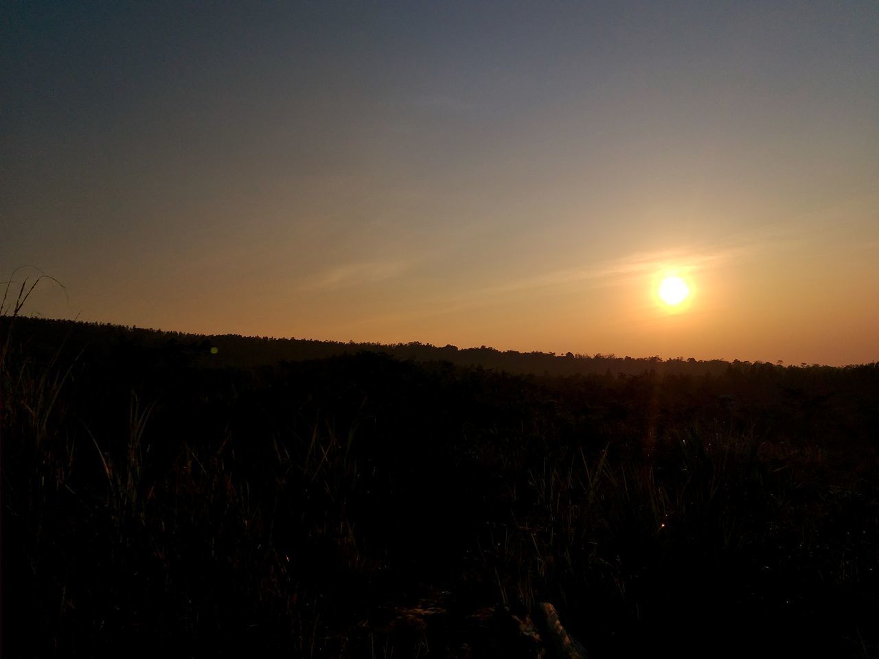 SCENIC VIEW OF SILHOUETTE LANDSCAPE AGAINST SKY DURING SUNSET