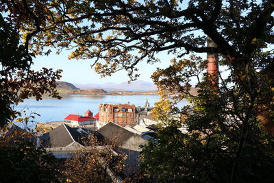 Oban. scenic view of sea and buildings against sky