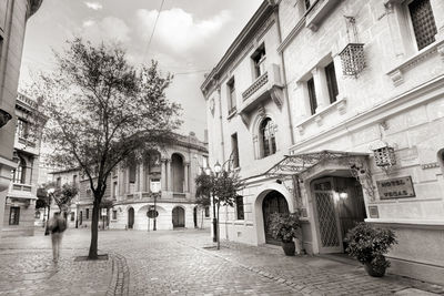 Alley amidst buildings in city