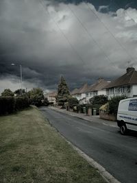 Road against cloudy sky