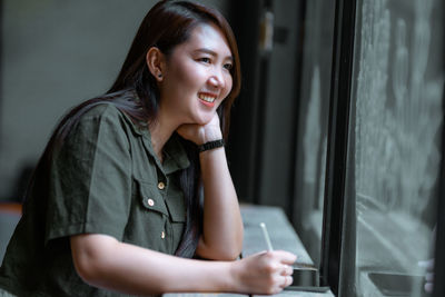 Young woman using mobile phone