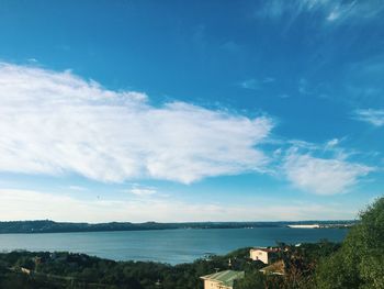 Scenic view of sea against blue sky