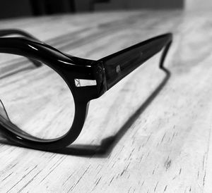 Close-up of sunglasses on table