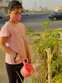 Full length of woman standing outdoors