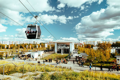 View of ski lift against cloudy sky