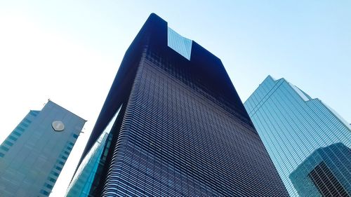 Low angle view of modern building against clear sky