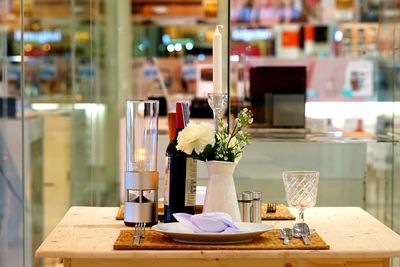 Close-up of potted plant on table in restaurant