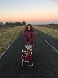 Girl with a puppy outdoors