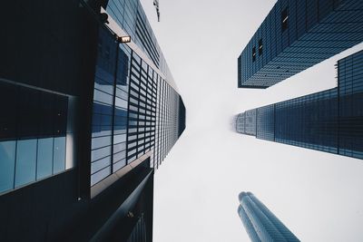 Low angle view of modern buildings against clear sky