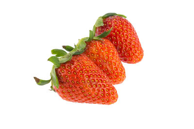 Close-up of strawberry against white background