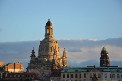 View of buildings in city against sky