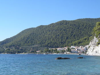 Scenic view of calm sea against clear sky