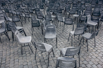 High angle view of empty chairs in row