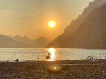 Scenic view of sea against sky during sunset