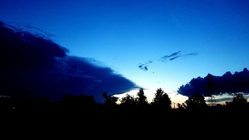 Scenic view of landscape against blue sky