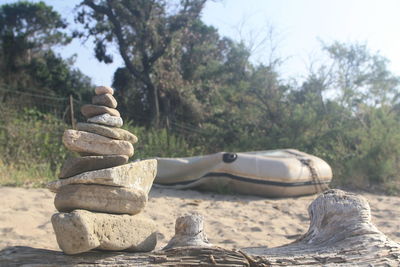 Stack of rocks on driftwood