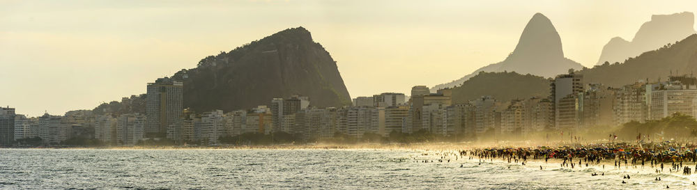 Panoramic view of buildings against sky during sunset