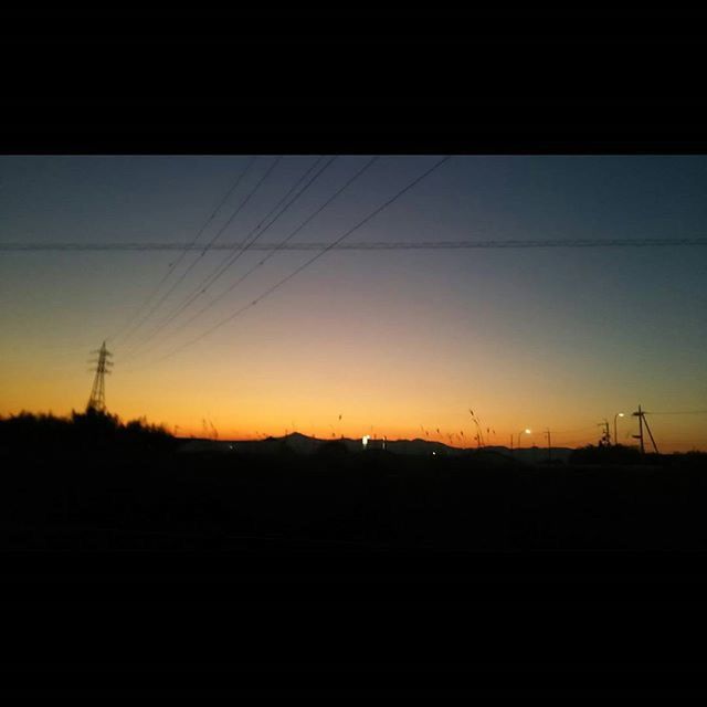sunset, silhouette, power line, electricity pylon, electricity, power supply, connection, fuel and power generation, orange color, cable, copy space, low angle view, sky, clear sky, technology, nature, dark, power cable, scenics, beauty in nature