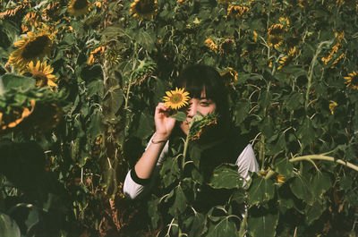 Woman holding plant