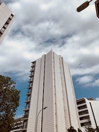 Low angle view of modern buildings against sky