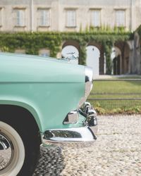 Cropped image of car on road