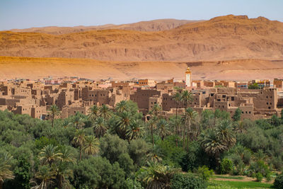 Scenic view of residential district against sky