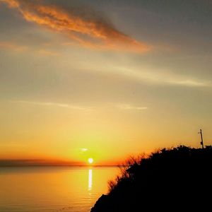 Scenic view of sunset over sea