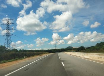 Empty road against sky