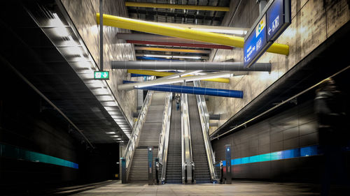 Low angle view of illuminated subway station