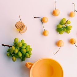 Close-up of fruit over white background