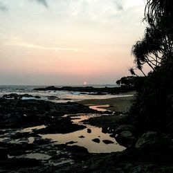 Scenic view of sea against sky at sunset