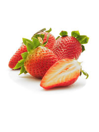Close-up of strawberries on white background