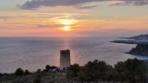 Scenic view of sea against sky during sunset