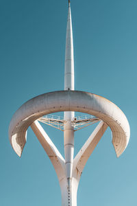 Low angle view of tower against clear blue sky