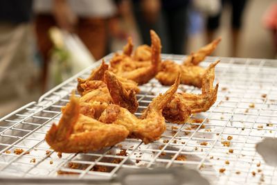 Close-up of serving food on table