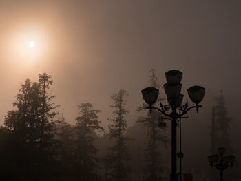 Street light against sky