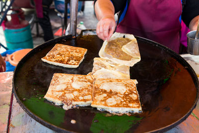 Close-up of hand holding food