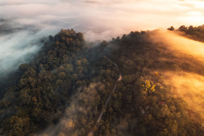 Scenic view of landscape against sky during sunset