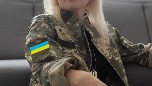 Sad military ukrainian woman in uniform