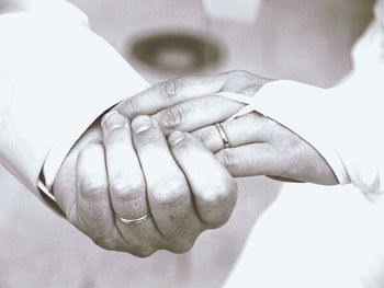 Cropped image of woman holding hands