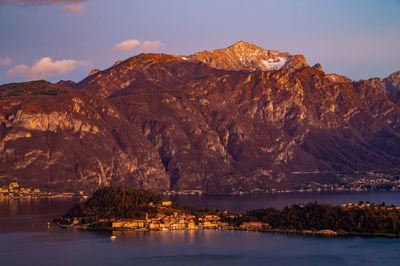 Lake como, bellagio, tremezzo and the mountains above, from tremezzo, at sunset.