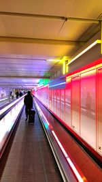 Illuminated train at subway station
